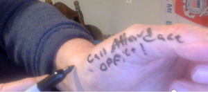 Man's thumb, with "Call Attendance Office" 